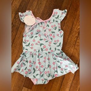 Sweet honey dancing leotard size 8, new with tags.